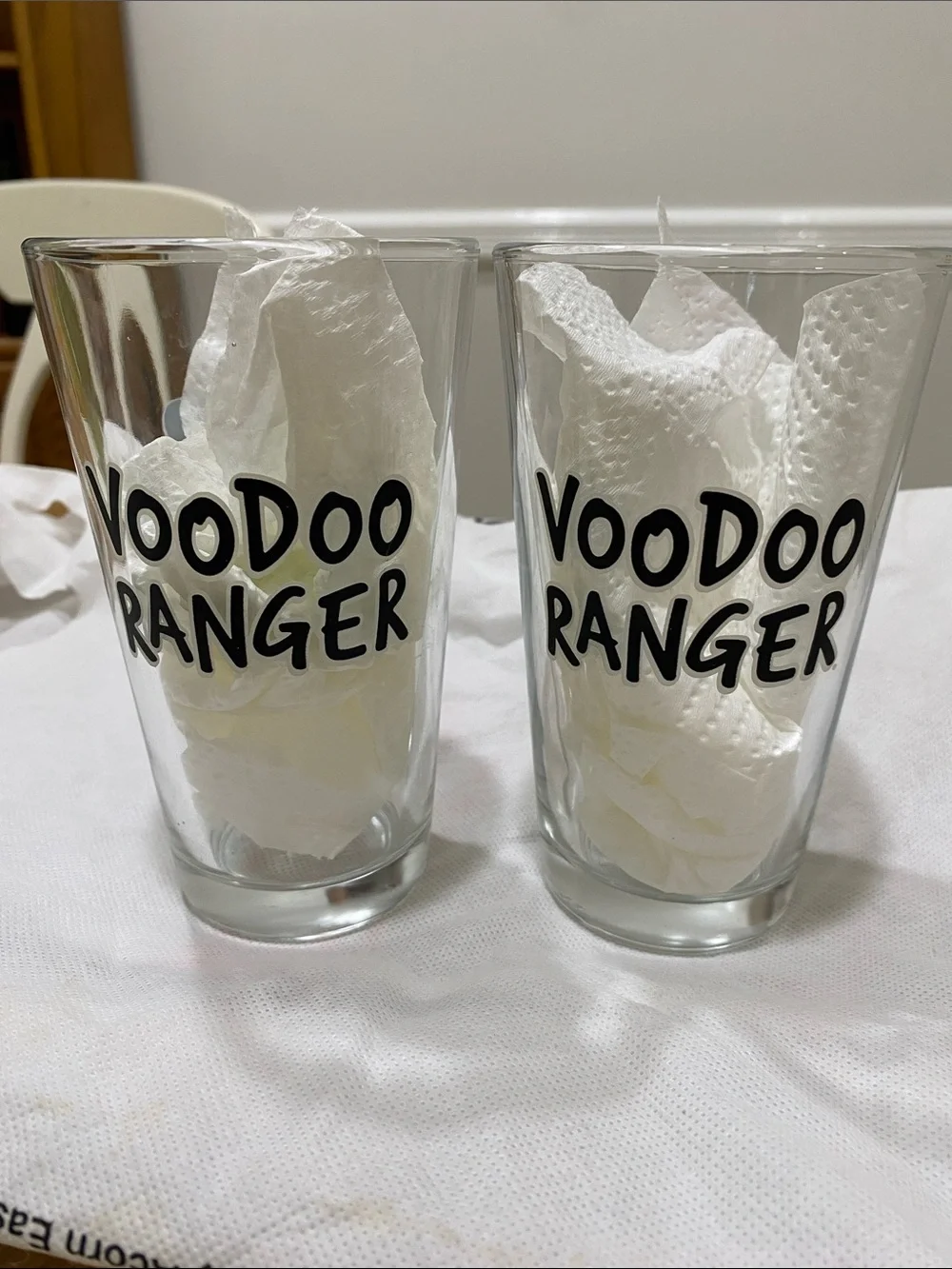 NWOT.  Set of 2, “Voodoo Ranger”, clear with black graphics, pint glasses.